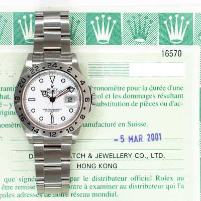 Rolex 16570 Explorer II 40mm steel featuring white polar dial and fixed 24-hour bezel pre-owned luxury