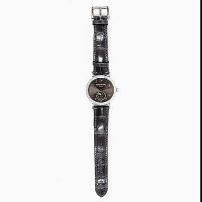 Patek 7121/200G-010 Complications 33mm white gold diamond bezel moon phase preowned feminine