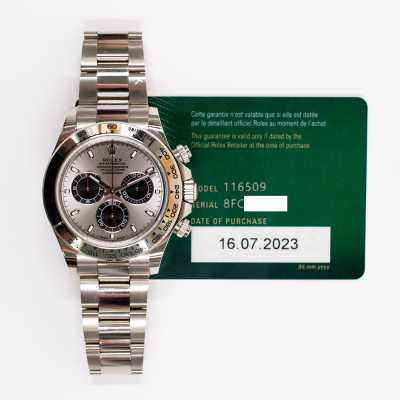 Rolex 116509 Daytona 40mm white gold racing chronograph featuring steel grey dial pre-owned luxury