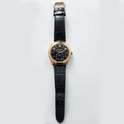 Patek Philippe Annual Calendar 5205R-010 40mm rose gold black dial moon phase preowned excellent